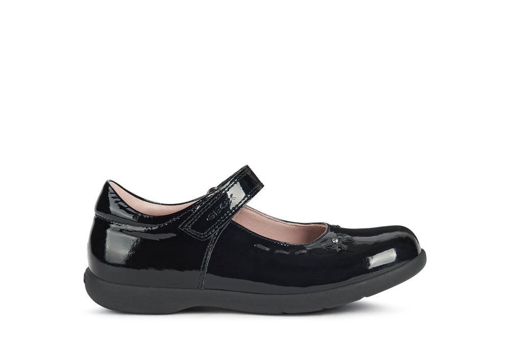 A girls Mary Jane school shoe by Geox, style Naimara, in black patent with velcro fastening. Right side view.