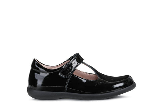 A girls t-bar school shoe by Geox, style Naimara, in black patent with velcro fastening. Right side view.