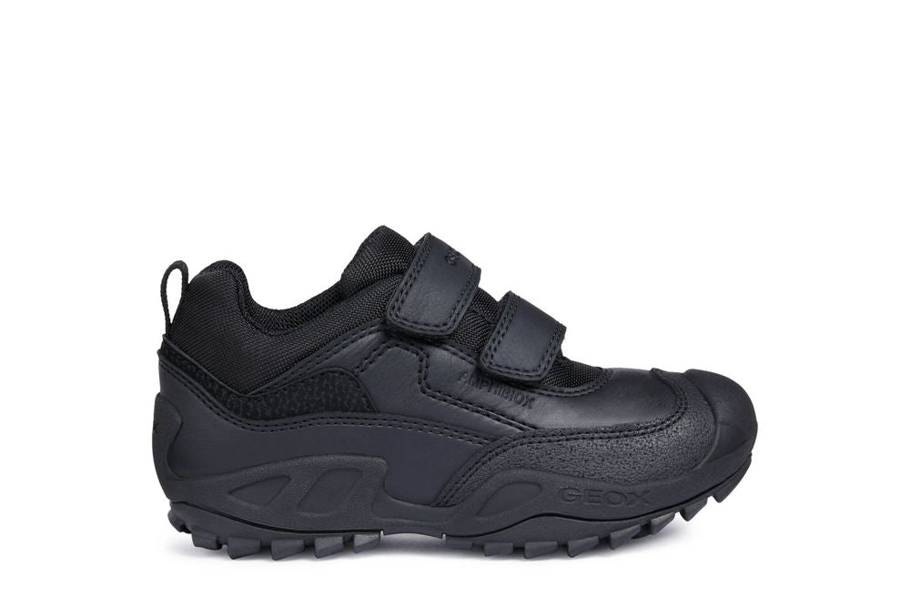 A casual waterproof school shoe by Geox, style J new Savage,in black with double velcro fastening. Right side view.