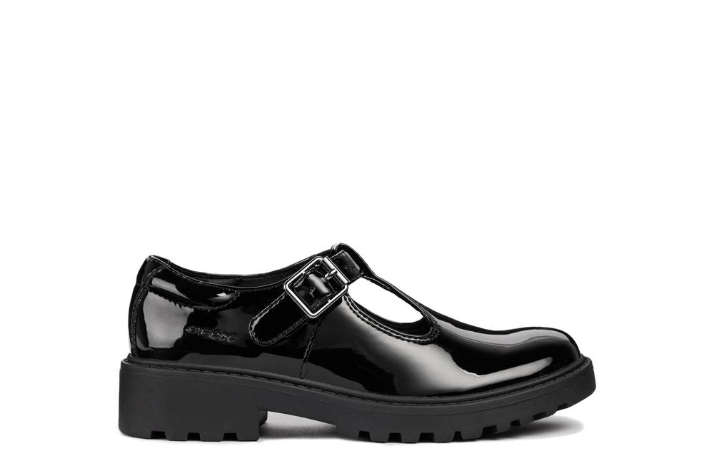 A girls smart school shoe by Geox,style Casey, in black patent with buckle fasteing. Right side view.