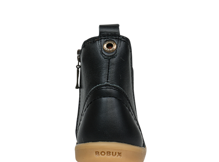 A unisex zip Chelsea boot by Bobux, style KP Jodphur, in black leather with zip fastening. Back view.