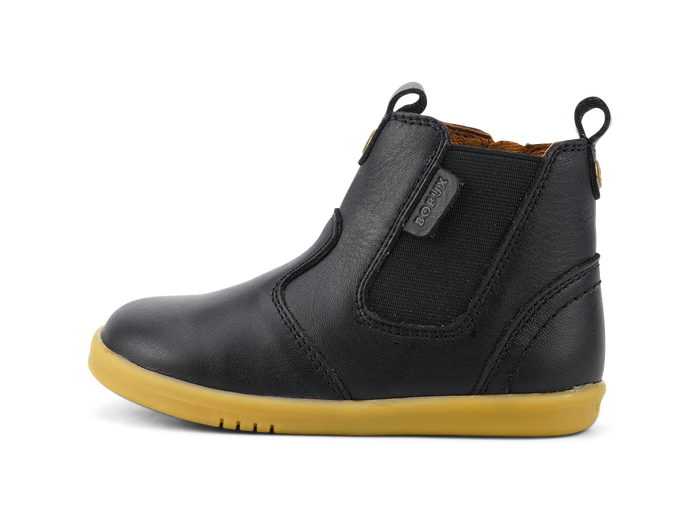 A unisex zip Chelsea boot by Bobux, style KP Jodphur, in black leather with zip fastening. Left side view.