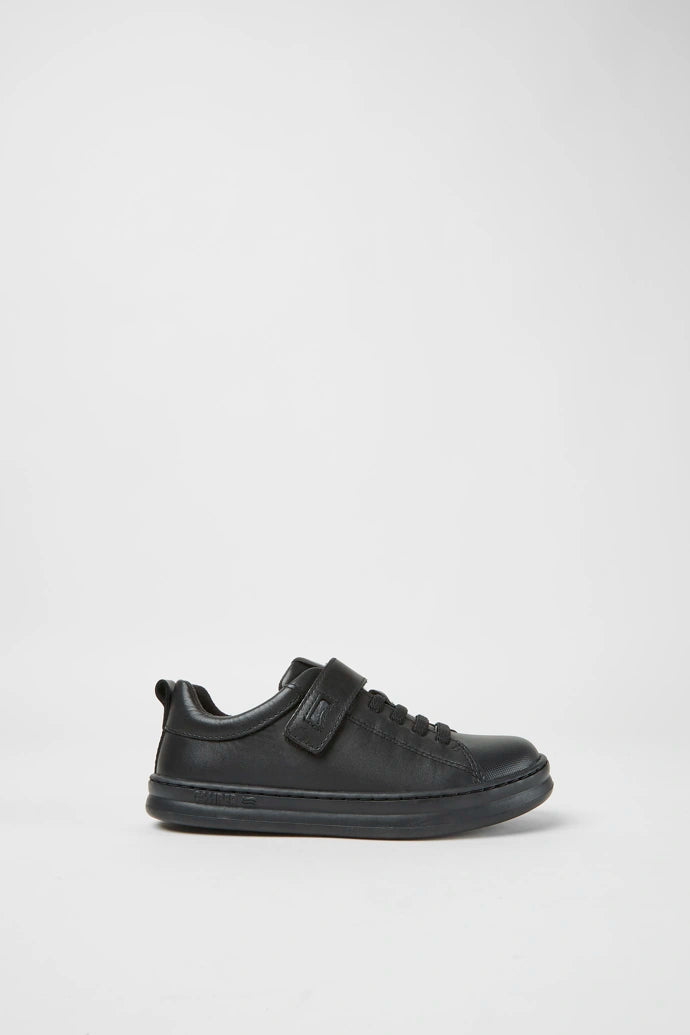 A boys casual school shoe by Camper,style K800319-001 in black leather with faux lace and zip fastening. Right side view.