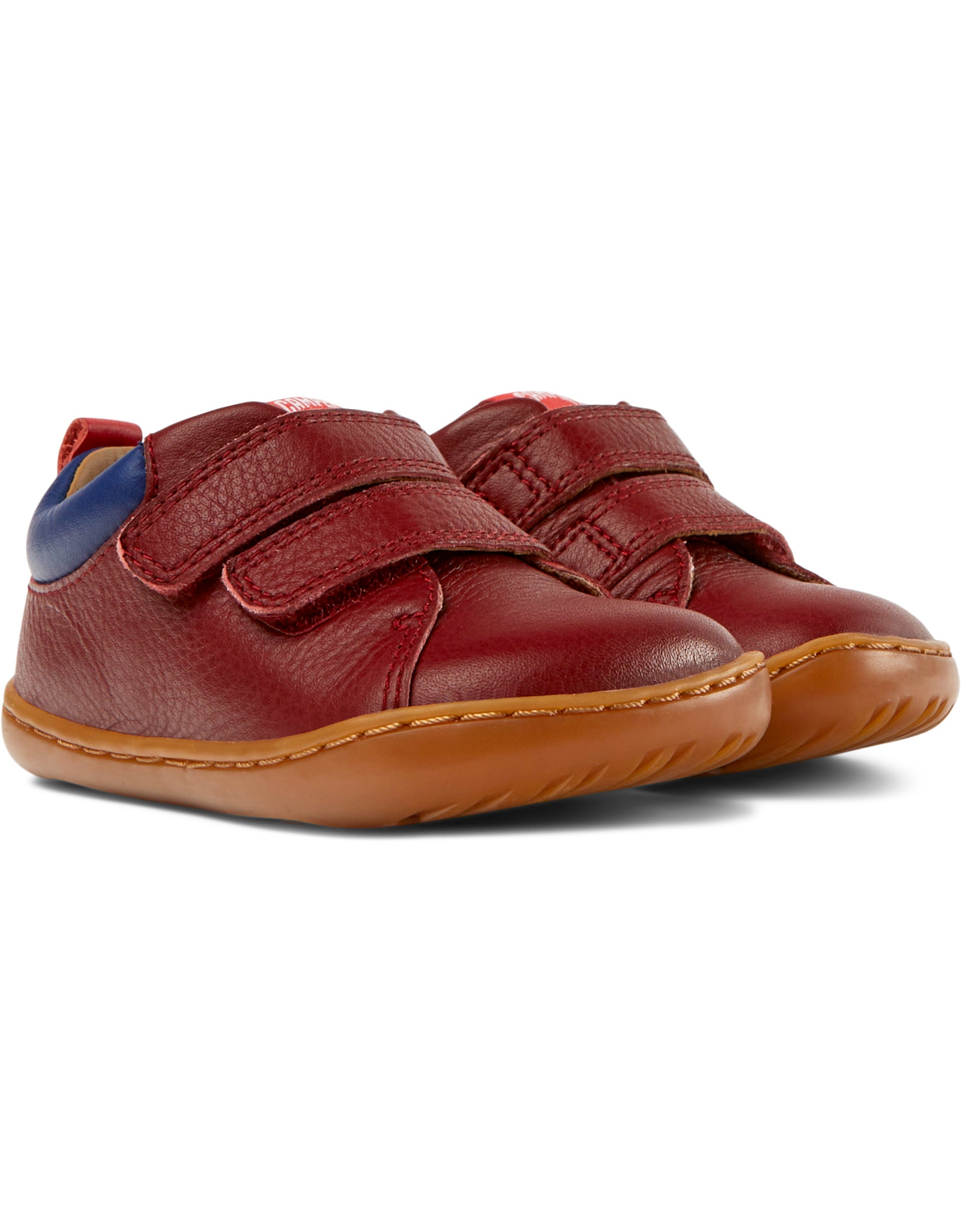 A boys casual shoe by Camper, style K800405-019, Peu Cami FW, in Burgundy Leather, with velcro fastening. Front pair view.