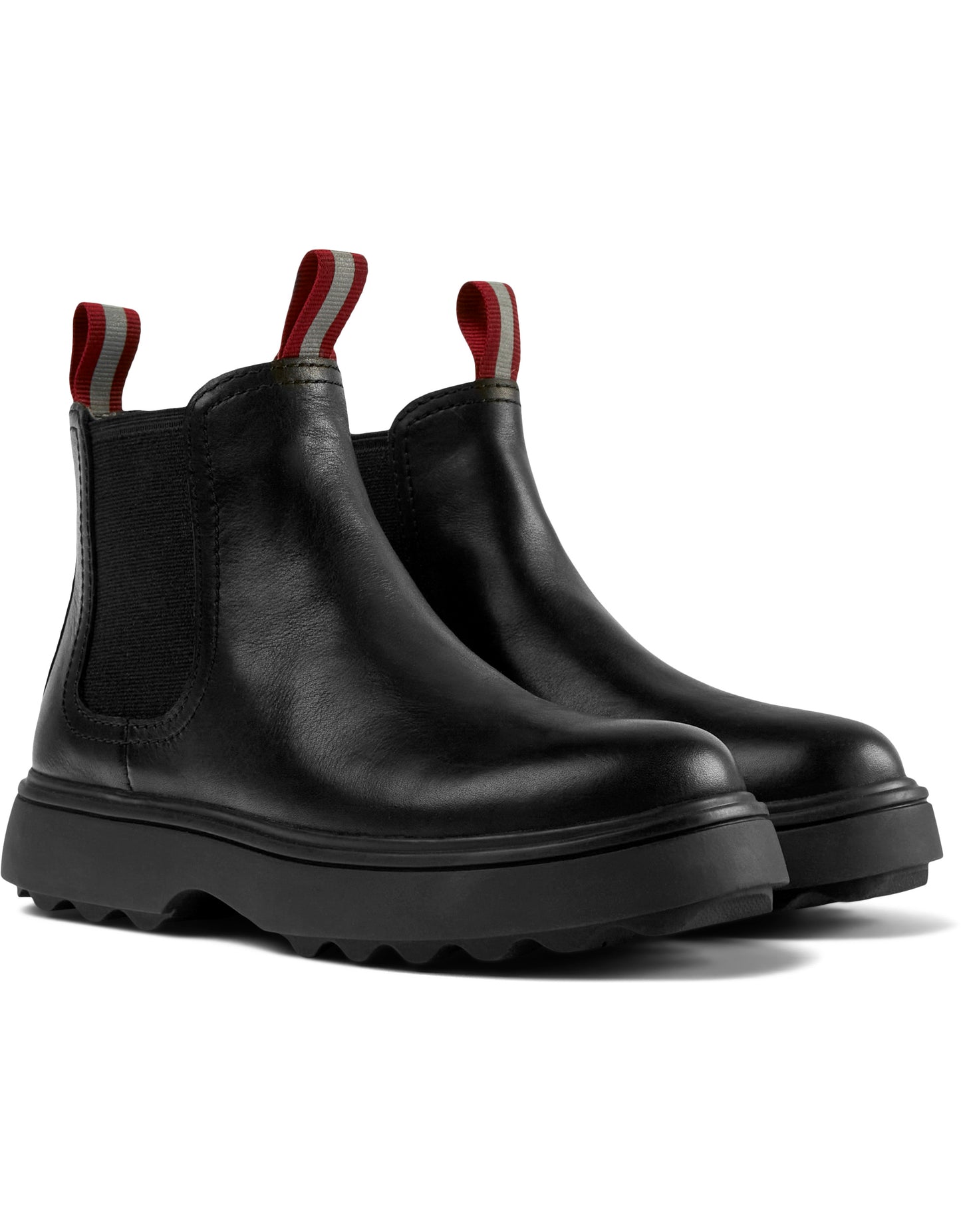 A pair of girls chunky chelsea boots by Camper, style K900149-001,in black leather,pull on style. Angled view.