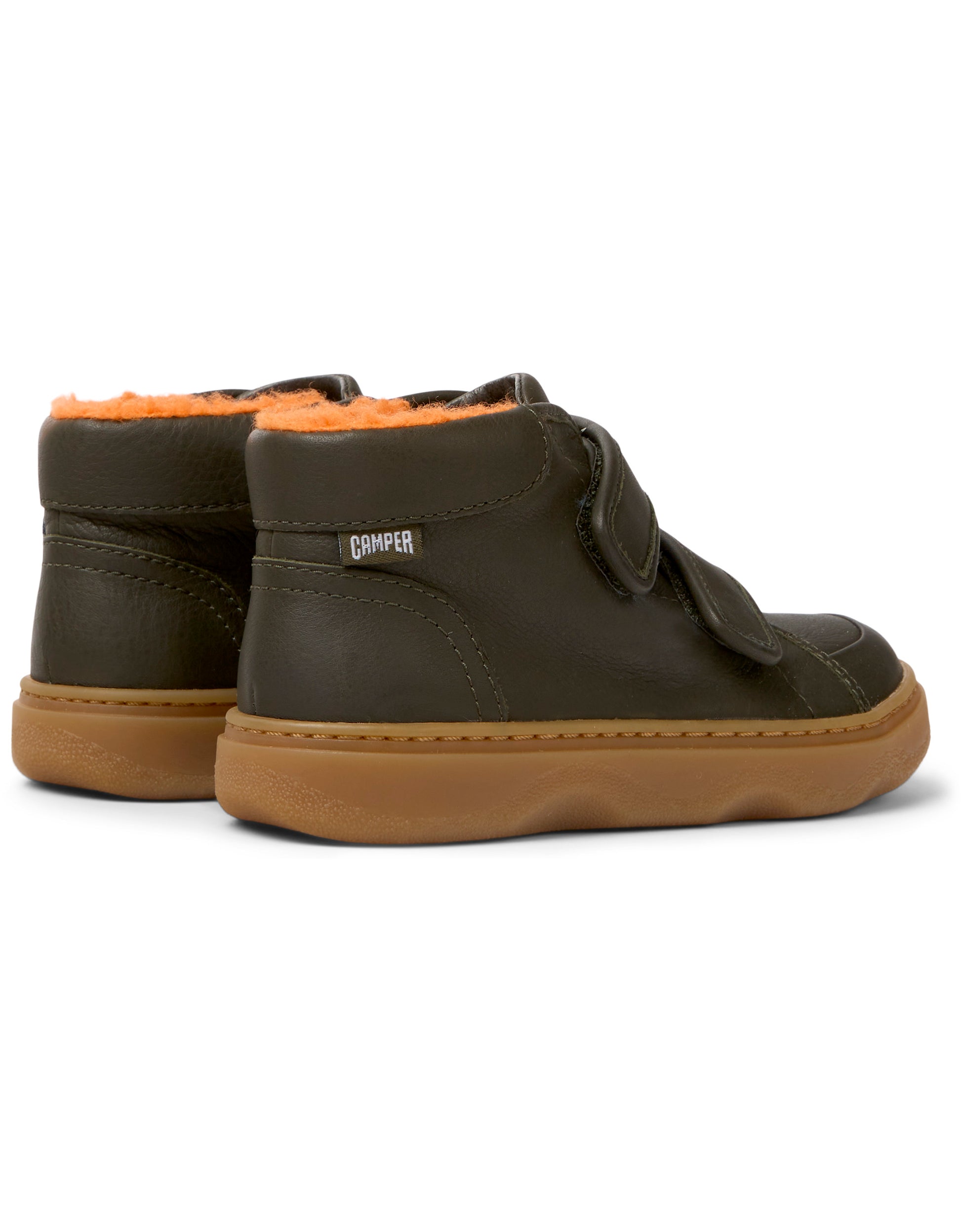 A boys casual ankle boot by Camper, style K900303-004 in brown leather with double velcro fastening. Angkled view.