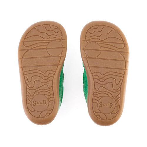A pair of boys casual shoes by Start Rite, style Maze, in green and white with double velcro fastening. Sole view..
