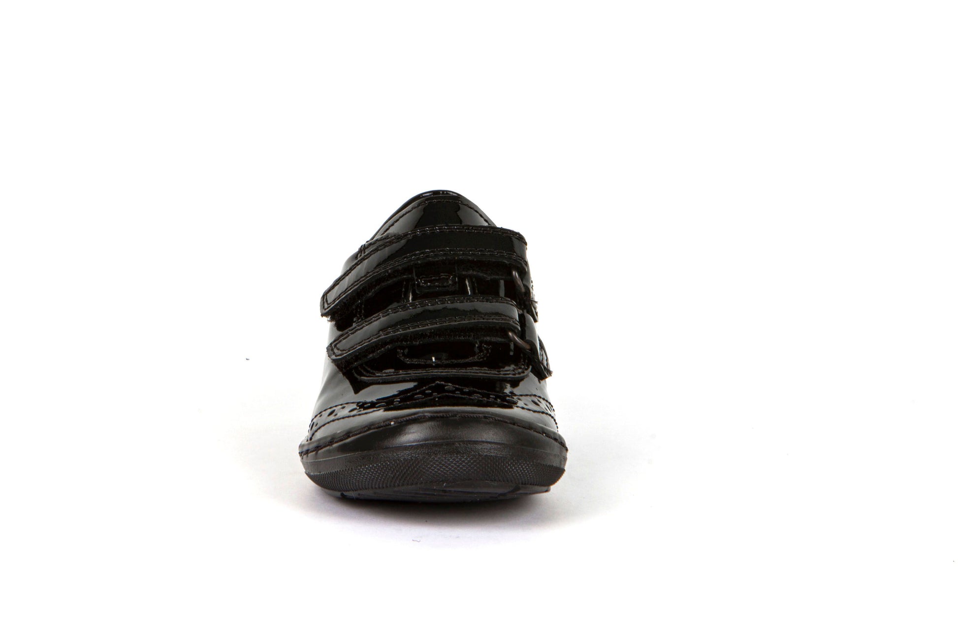 A girls school shoe by Froddo, style Mia D in black patent with velcro fastening. Front view.