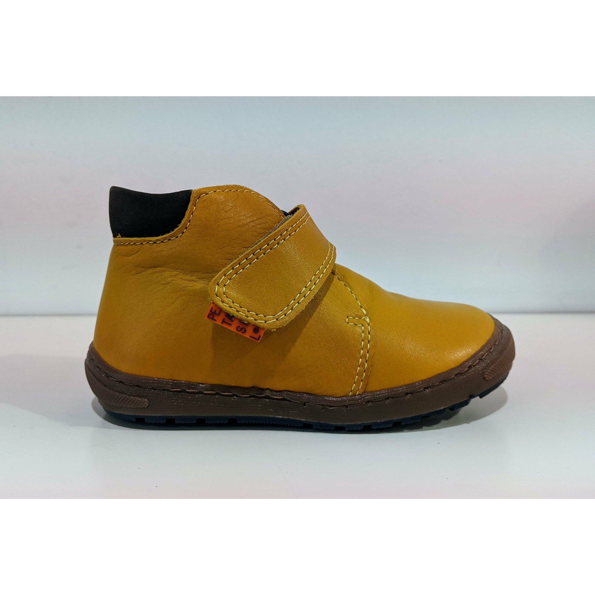 A boys ankle boot by Petasil, style Jason, in yellow with velcro fastening. Right side view.