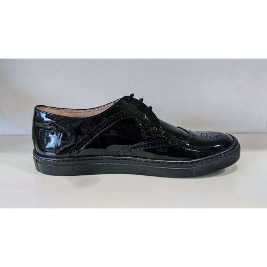 A girls school shoe by Petasil, style Pan, in black patent with lace up fastening. Right side view.