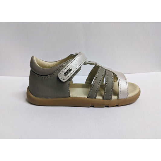 A girls open toe sandal by Bobux,style Precious, in Taupe with velcro fastening. Right side view.