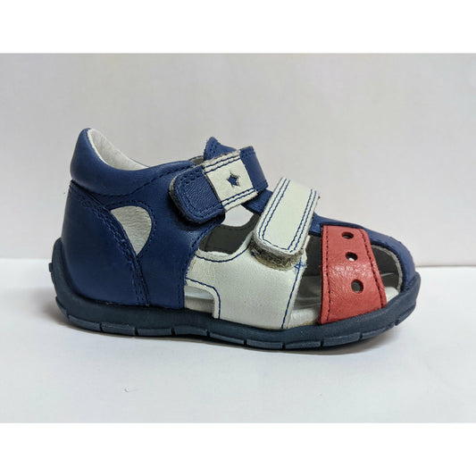 A boys closed toe sandal by Froddo, style G2150071-1, in Blue,White and Red leather with velcro fastening. Right side view.