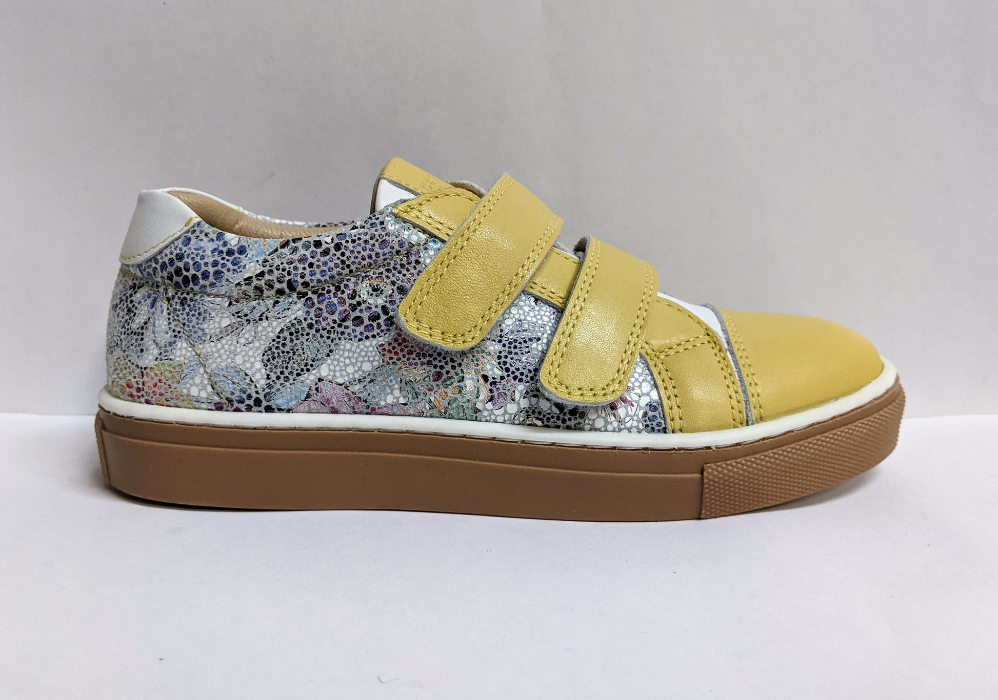A girls casual trainer by Petasil,style Jasmine, in yellow multi with double velcro fastening. Right side view.