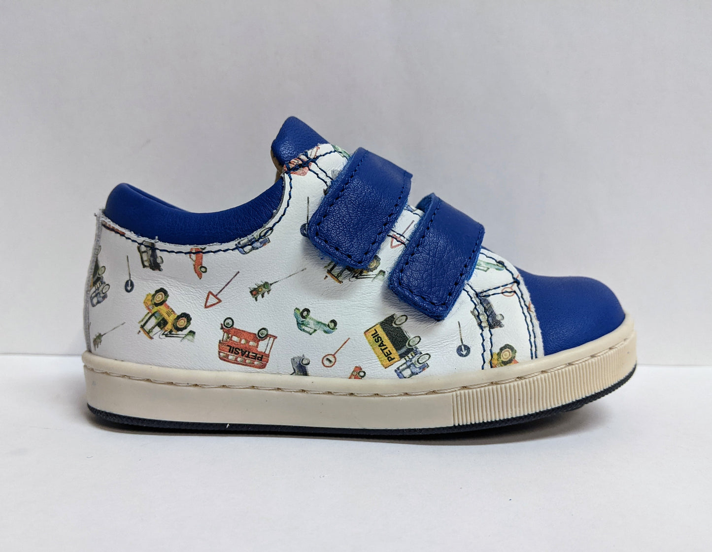 A boys casual trainer by Petasil,style Todd 2, in blue and white multi with double velcro fastening. Right side view.
