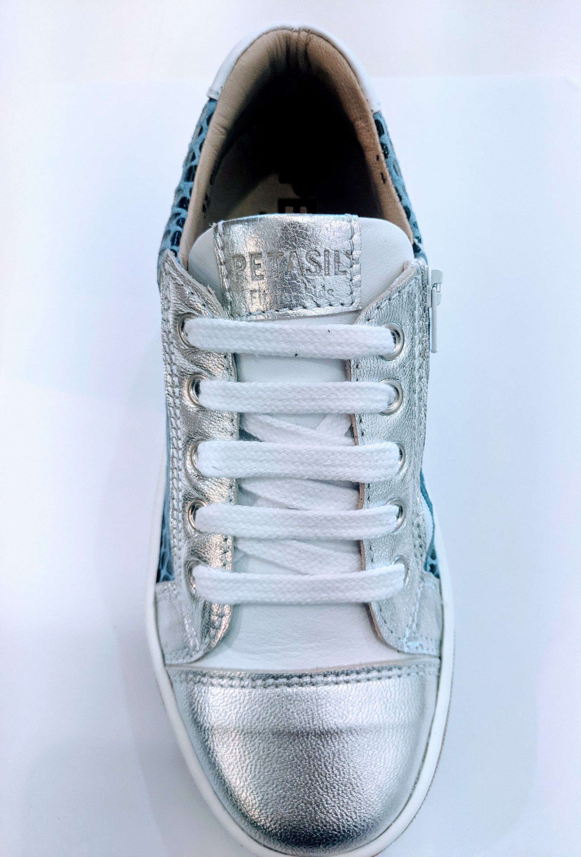 A girls casual trainer by Petasil ,style Annie, in silver and blue with zip and lace fastening. Above view.