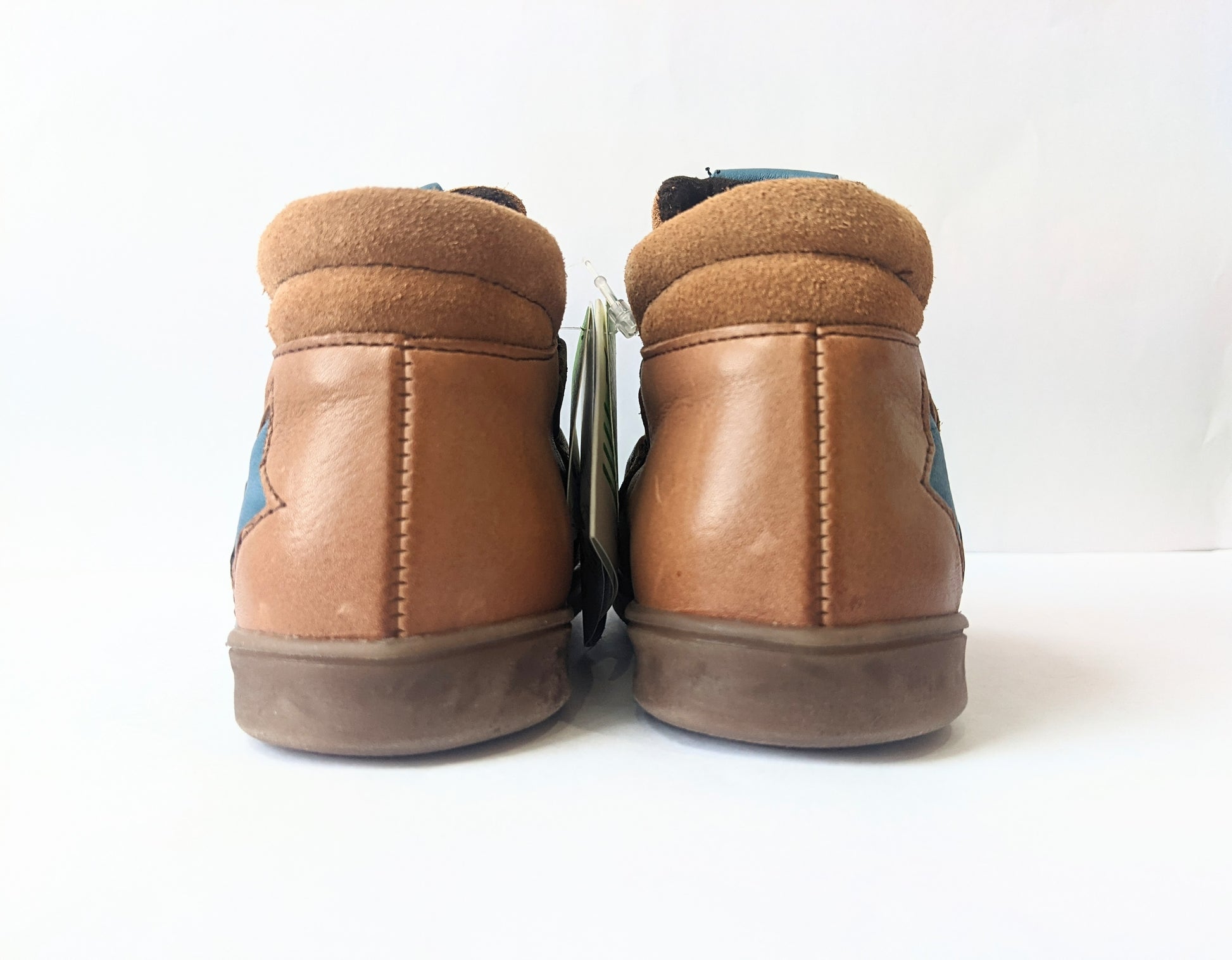 A boys casual ankle boot by Froddo, style G2110083, in tan multi with double velcro fastening. Back view.