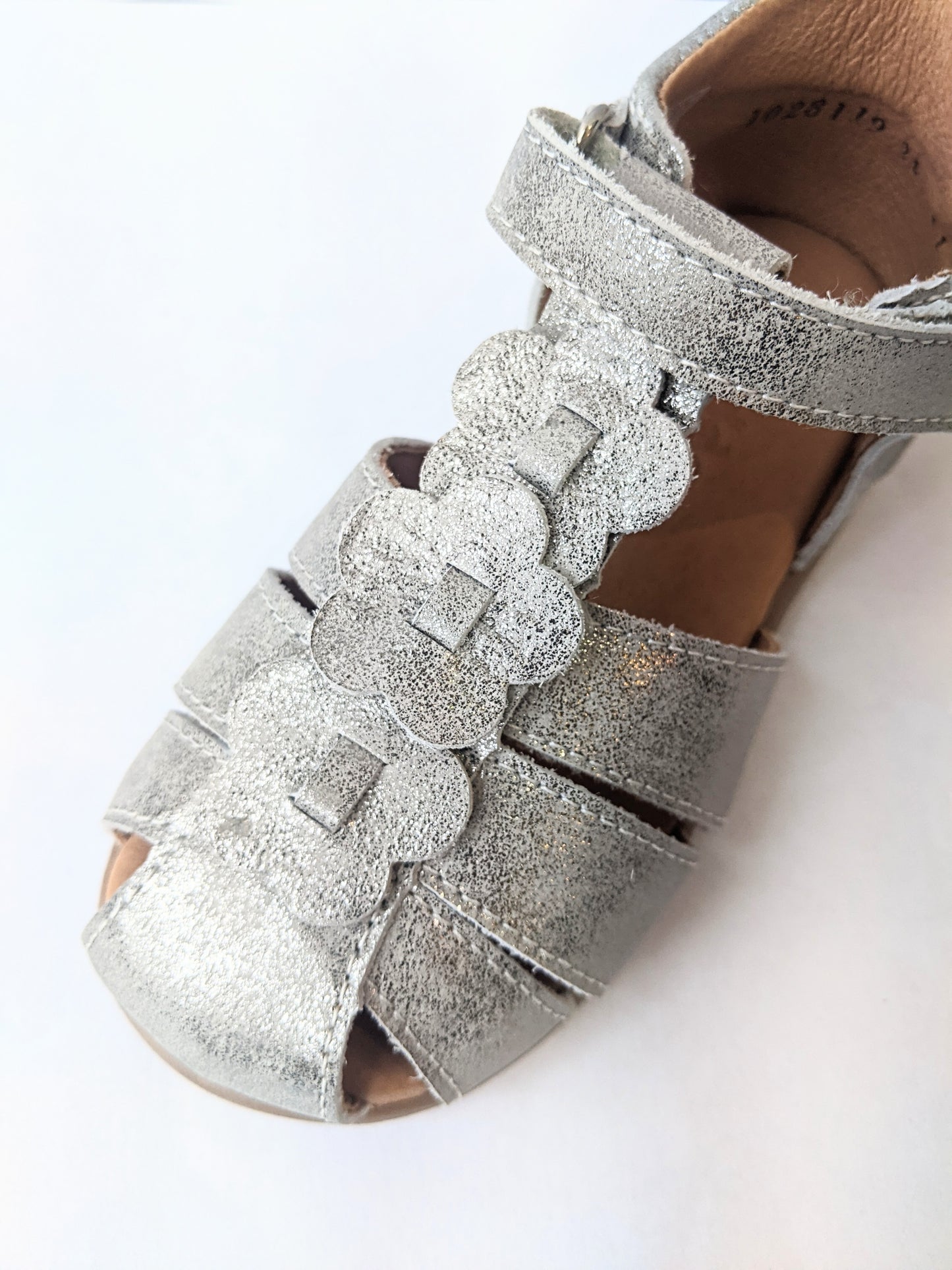 A girls closed toe sandal by Froddo, style G2150094-5, in silver with velcro fastening. Top view.