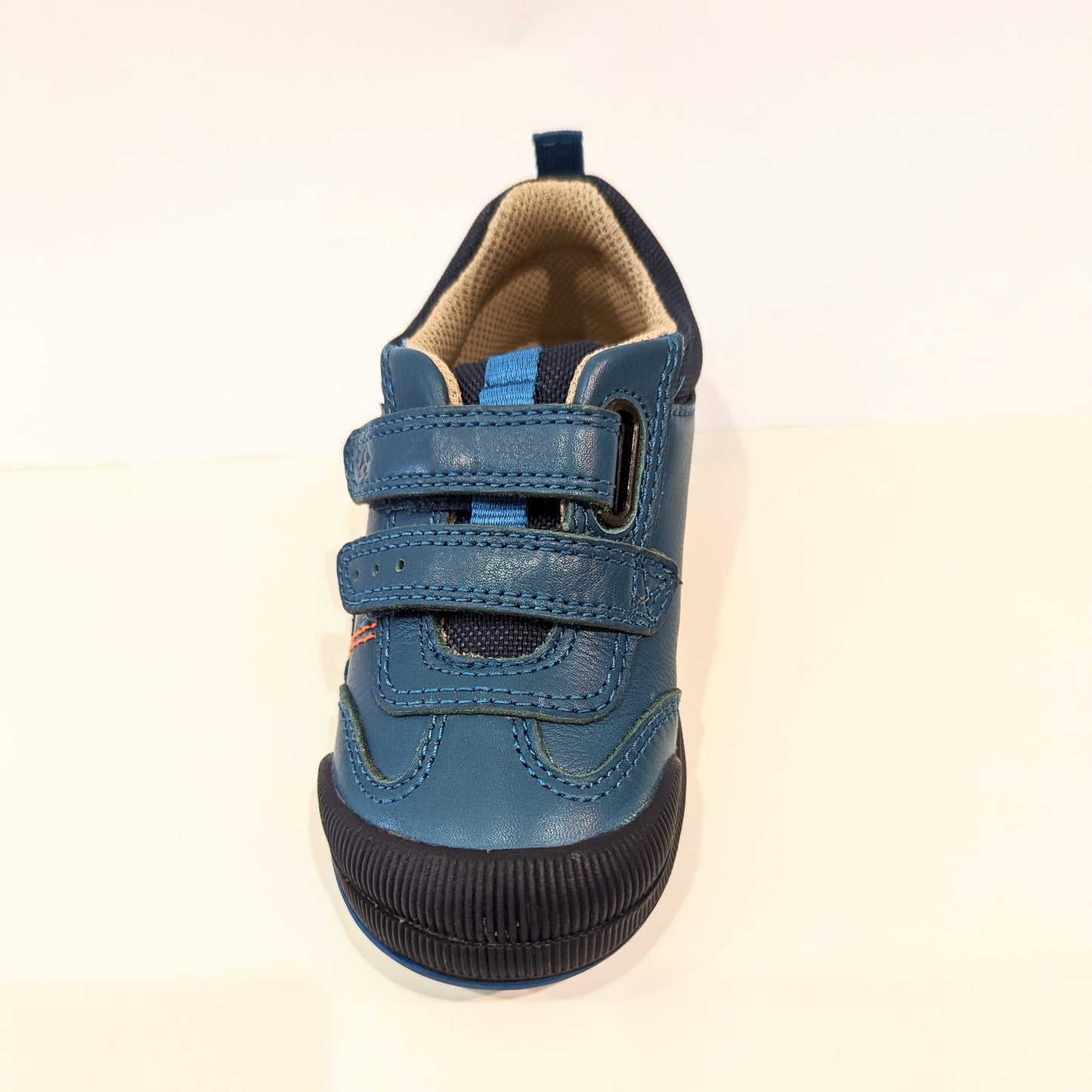 A boys casual shoe by Start Rite, style Tickle, in teal leather with double velcro fastening. Front view.