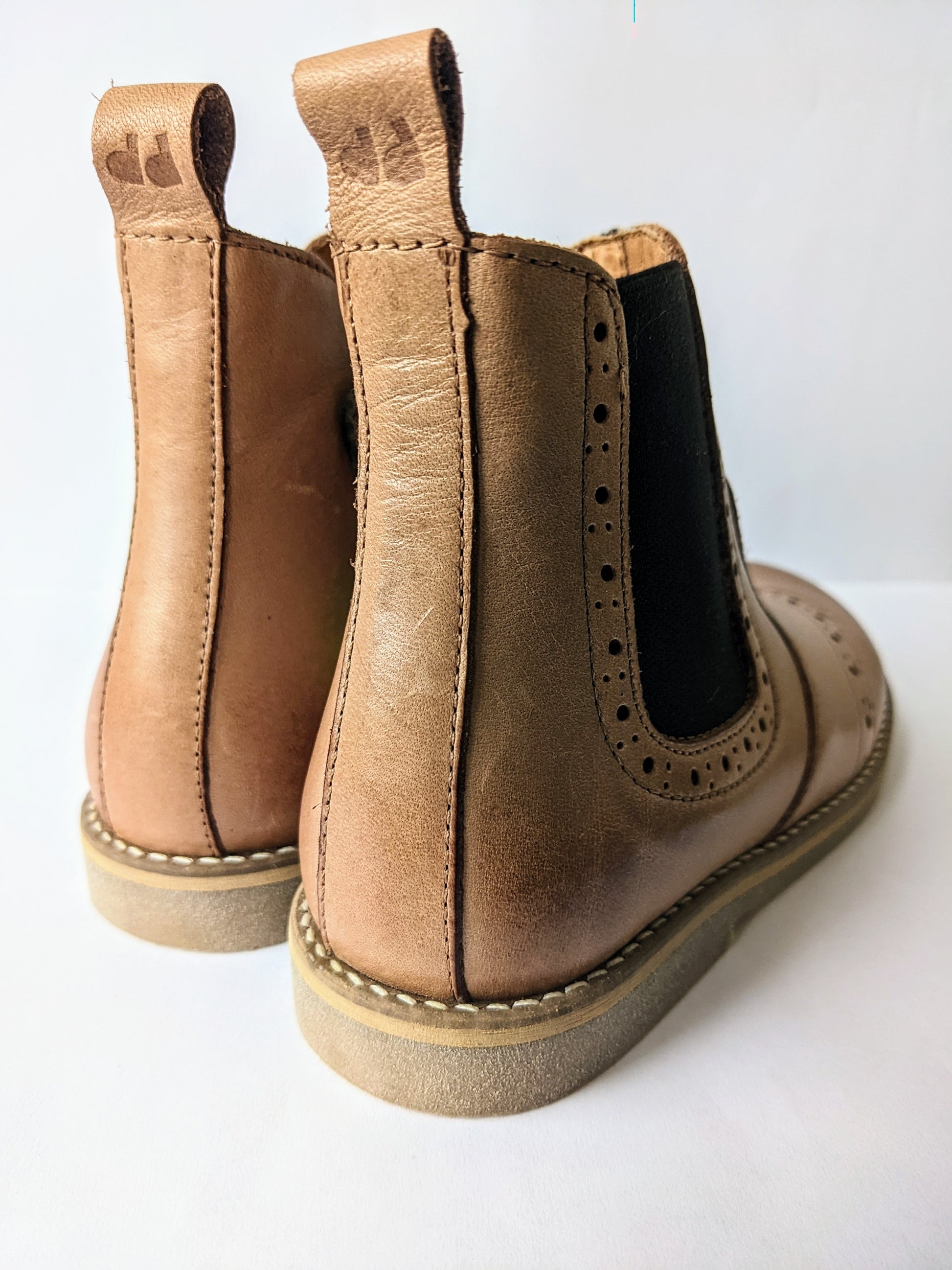 A pair of unisex ankle boots by Froddo,style G3160173-9 in tan leather with zip fastening. Back view.