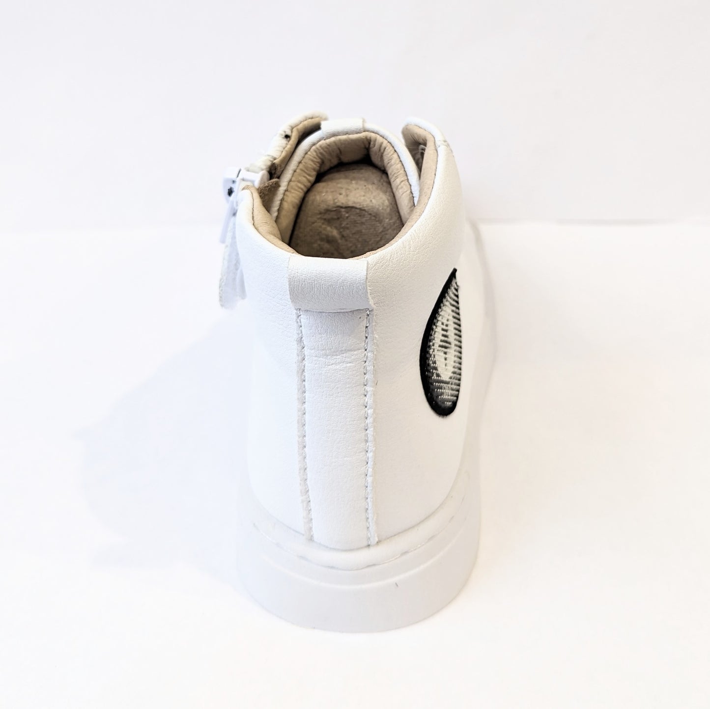 A unisex hi-top by Shoesme, style SH21S008-F, in white with logo detail, lace/zip up. View of the back.