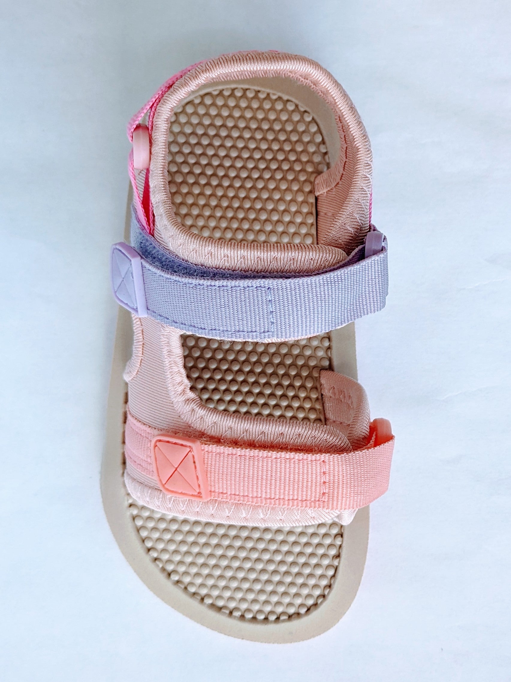 A girls open toe sandal by Shoesme, style LS23S001-A, in pink/lilac multi fabric with velcro fastening. Top view.