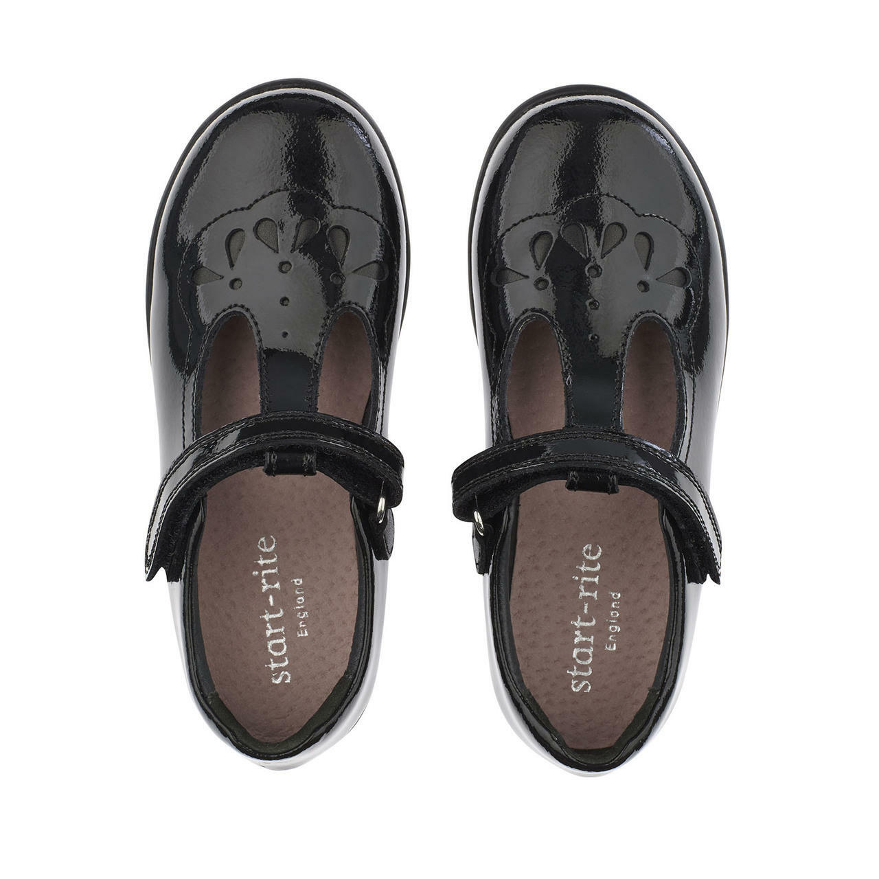 A pair of girls school shoes by Start Rite, style Poppy, in black patent with velcro fastening. Above view.