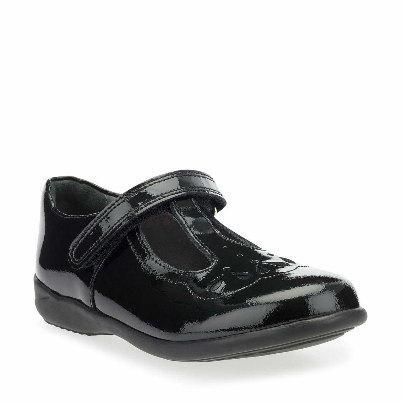 A girls school shoe by Start Rite, style Poppy, in black patent with velcro fastening. Angled view.