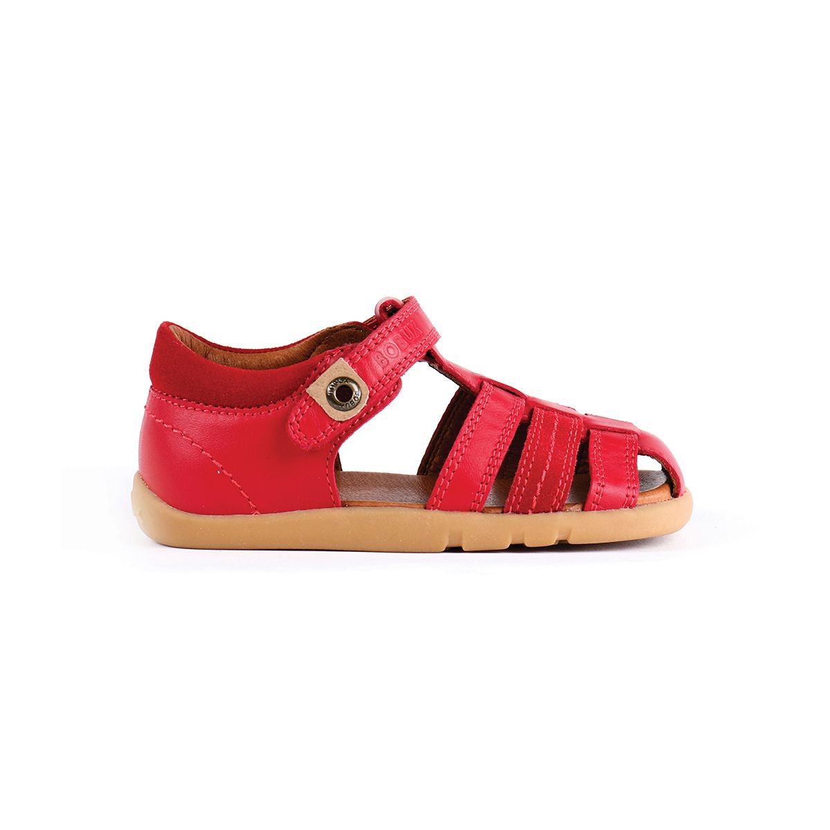 A boys closed toe sandal by Bobux,style Roam,in red with velcro fastening. Right side view.