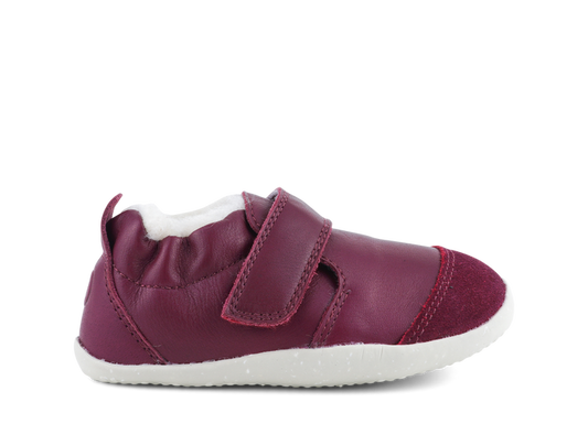 A girls fur lined pre walker by Bobux, style XP Marvel Arctic, in berry suede/leather wth velcro fastening. Right side view.