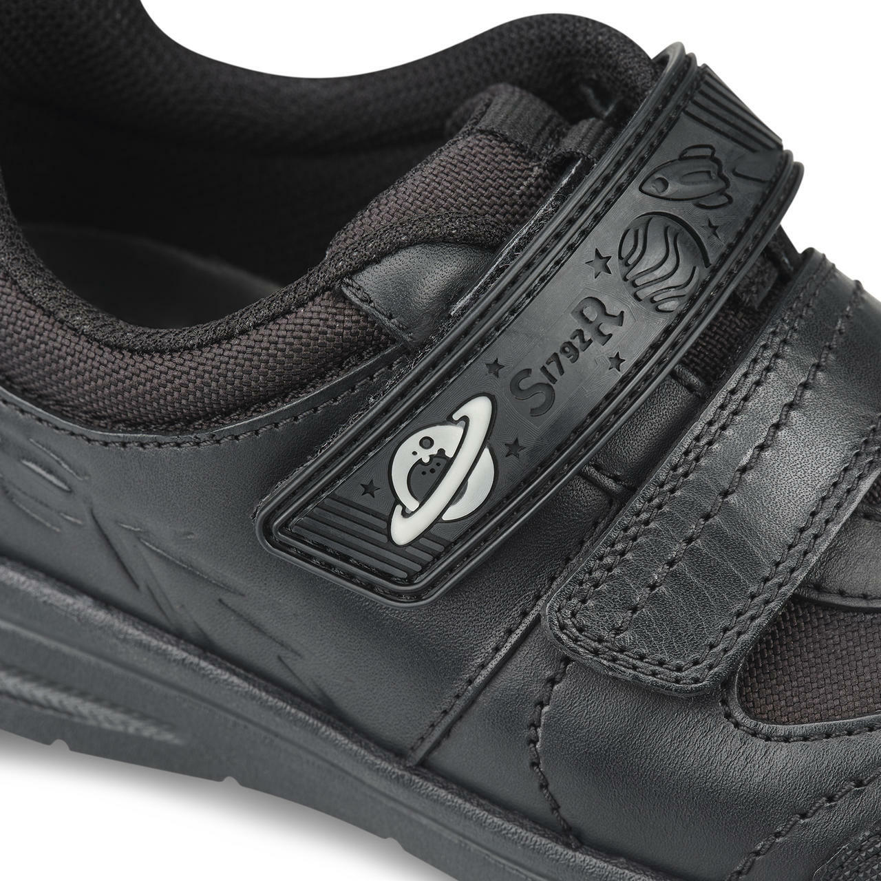 A boy school shoe by Start Rite,style Rocket, in black leather with double velcro fastening. Close up view.