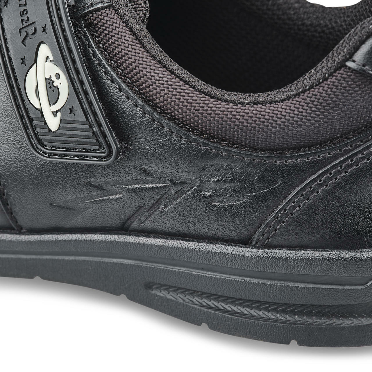 A boys school shoe by Start Rite,style Rocket, in black leather with double velcro fastening. Close up  view.