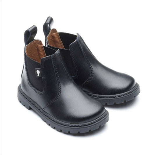 A pair of unisex chelsea boots by Chipmunks, style Ranch, in black leather. Angled view.