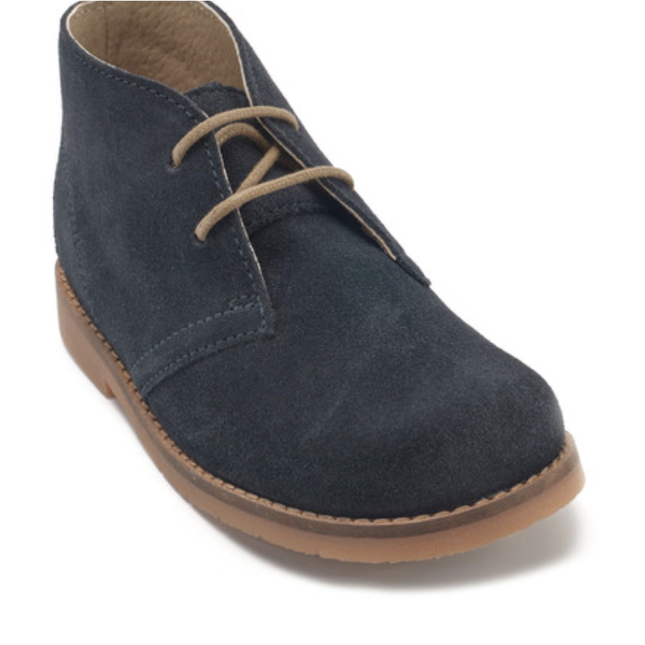 A desert boot by Start-Rite, style Autumn, in navy suede with light brown laces and sole. Front angled view.