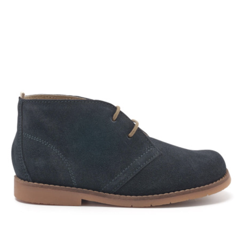 A desert boot by Start-Rite, style Autumn, in navy suede with light brown laces and sole. Right side view.