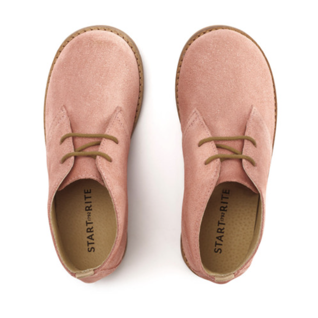 A girls desert boot by Start-Rite, style Autumn, in dusky pink glitter suede with light brown laces and soles. Top view of a pair.