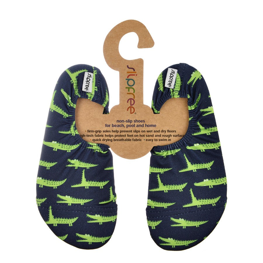 A boys non slip shoe by Slipfree, style Gator, in navy and green. Front view.