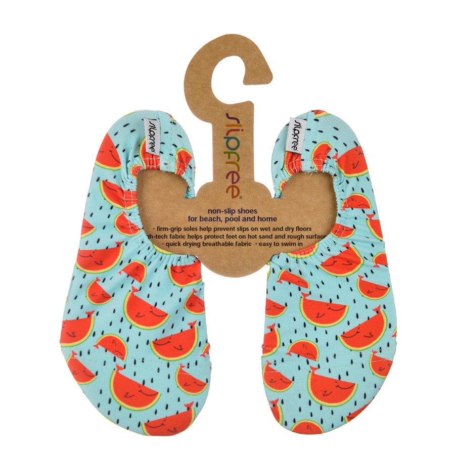 A pair of girls swim shoes by Slipfree, style Watermelon, in red and light blue print. Front view.