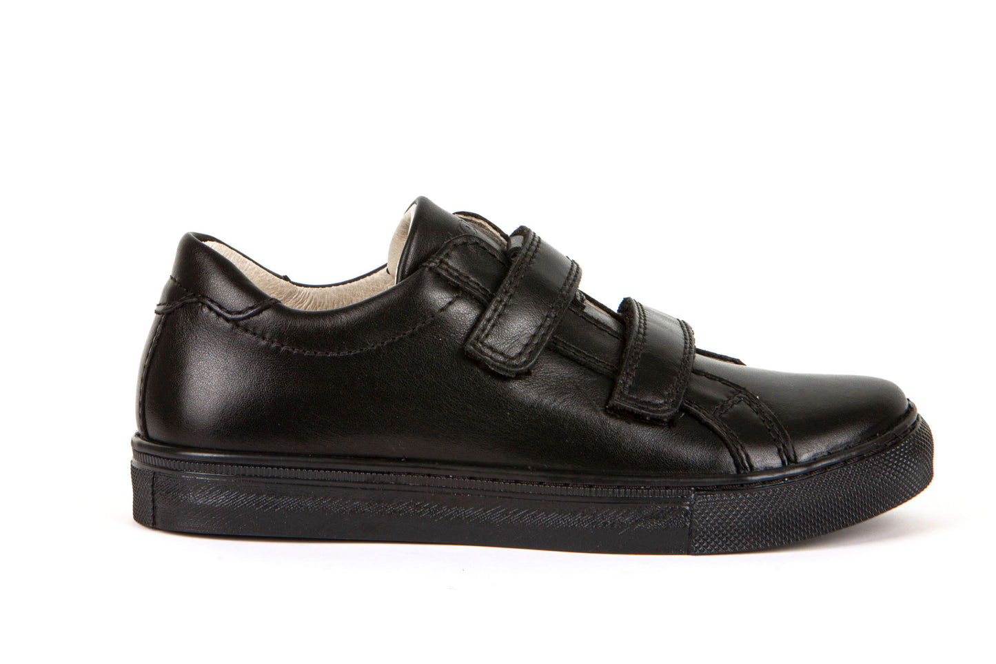 A boys casual school shoe by Froddo, style Morgan D in black with velcro fastening. Right side view.
