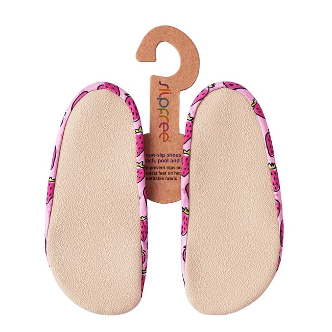 A pair of girls slipfree swim shoes, style Strawberry,in pink. Sole view.