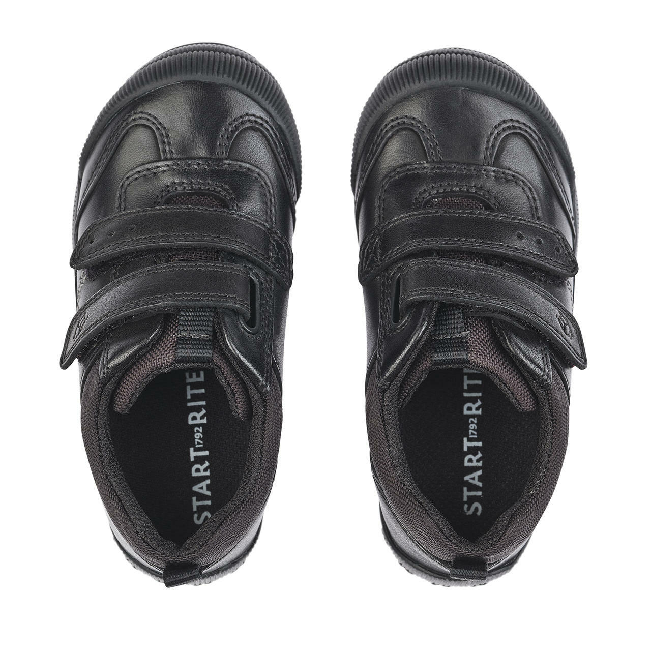 A pair of boys pre school shoes by Start Rite,style Tickle, in black leather with double velcro fastening. Top view.