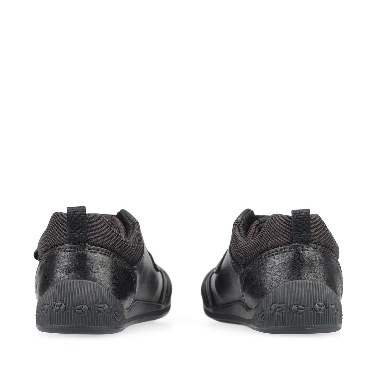 A pair of boys pre school shoes by Start Rite,style Tickle, in black leather with double velcro fastening. Back view.