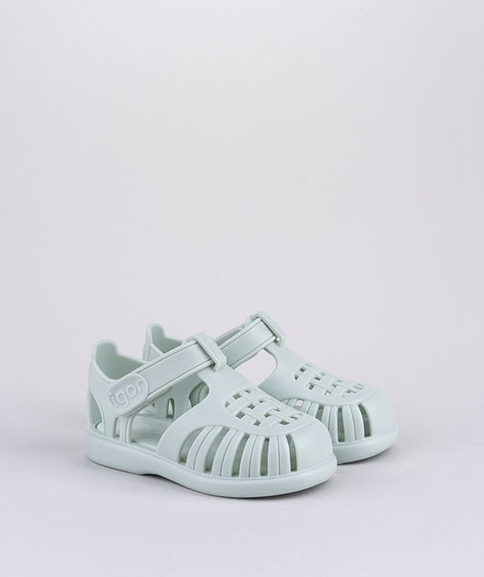 A pair of unisex closed toe sandals by Igor,style Tobby, in pale green with velcro fastening. Right side view.