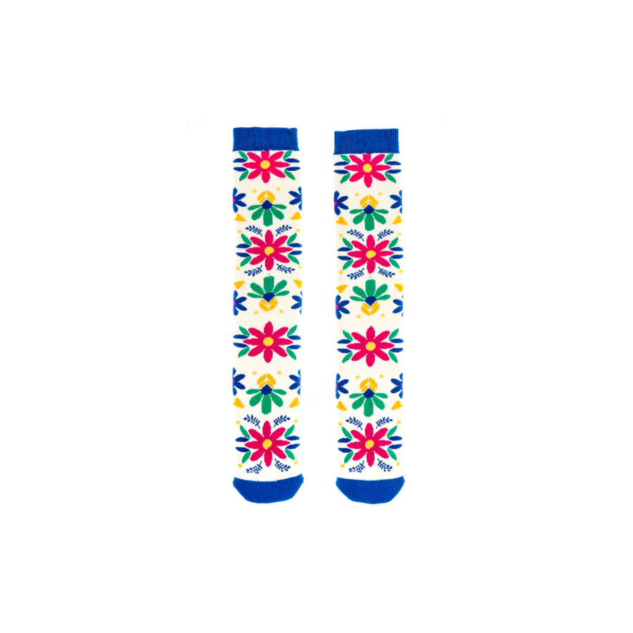 A pair of junior socks by Squelch, style Mexican Flowers, in cream multi. Front view.