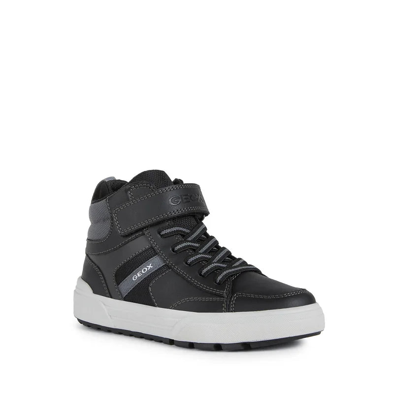 A boys Hi-top by GEox, style J Weemble Boy, in black and grey, velcro fastening with elastic laces. Angled view.