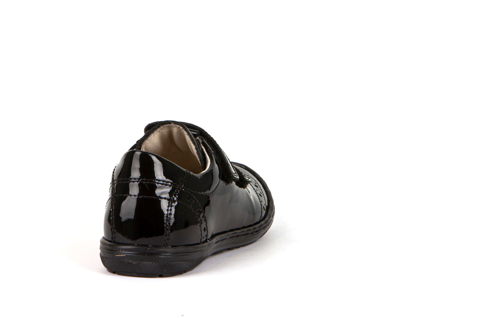 A girls school shoe by Froddo, style Mia D in black patent with velcro fastening. Back view.