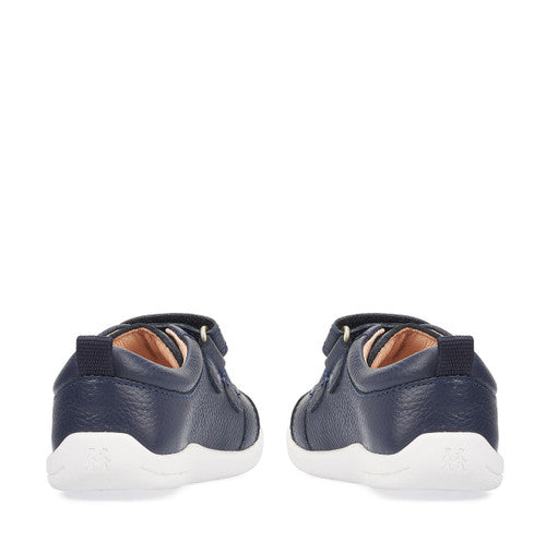 A pair of boys casual shoes by Start Rite,style Tree House, in Navy leather with double velcro fastening. Back view.